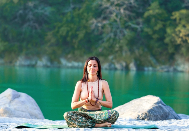 Yoga teaching approach at Rishikesh Yogkulam — Hatha yoga class with personal guidance